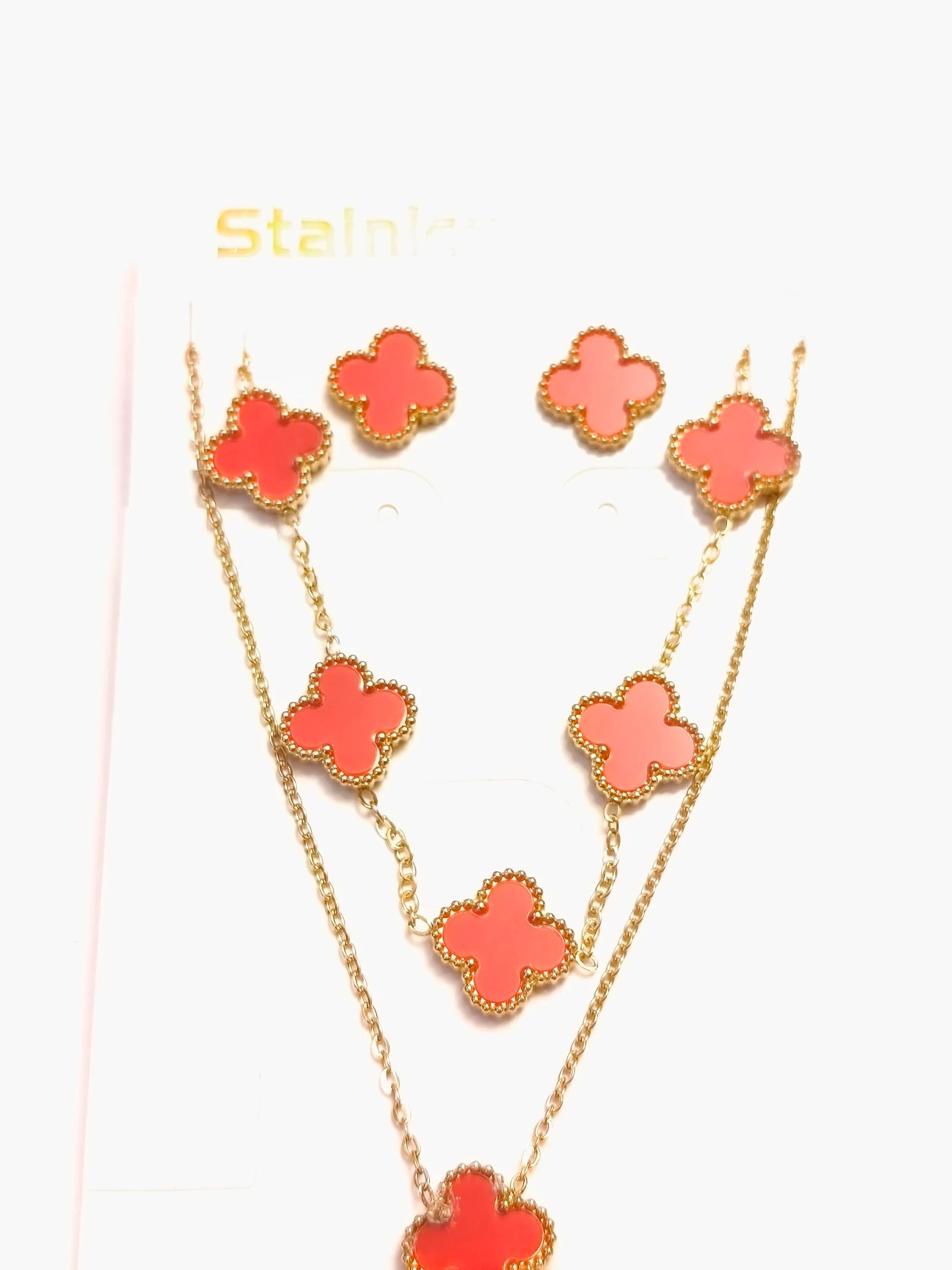 Set de gargantilla, pulsera y pendientes de trebol